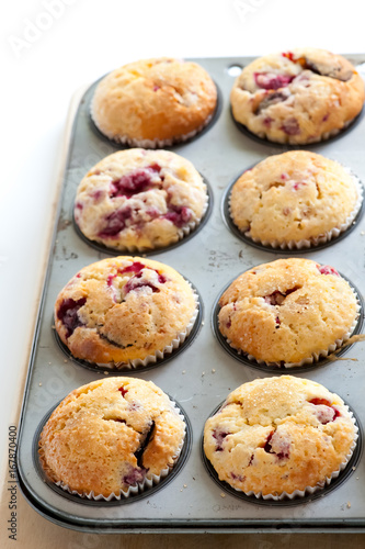 Homemade muffins with raspberries and dark chocolate