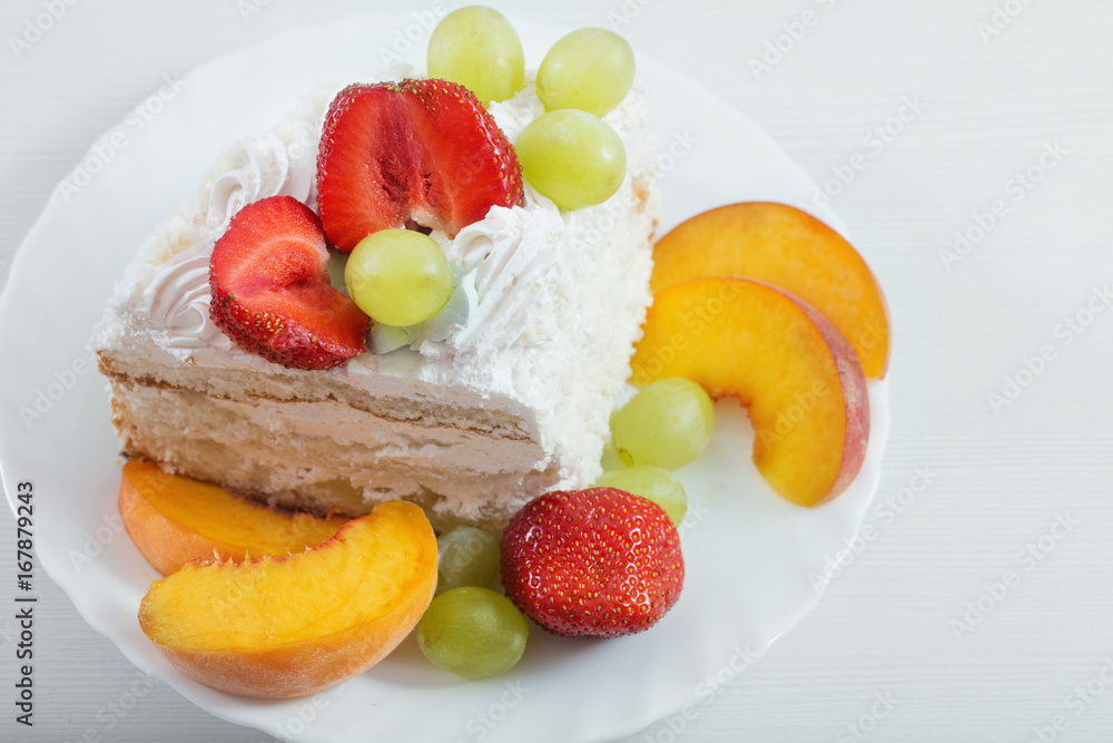cake with fruits on white table cake with fruits on white table