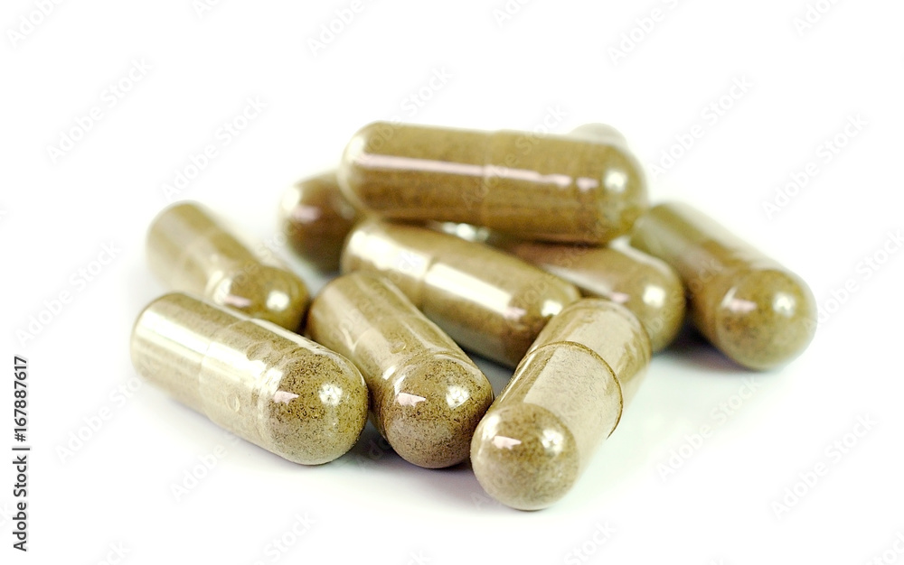 Herbal drugs capsules isolated on white. Herbal drugs capsules isolated on white.