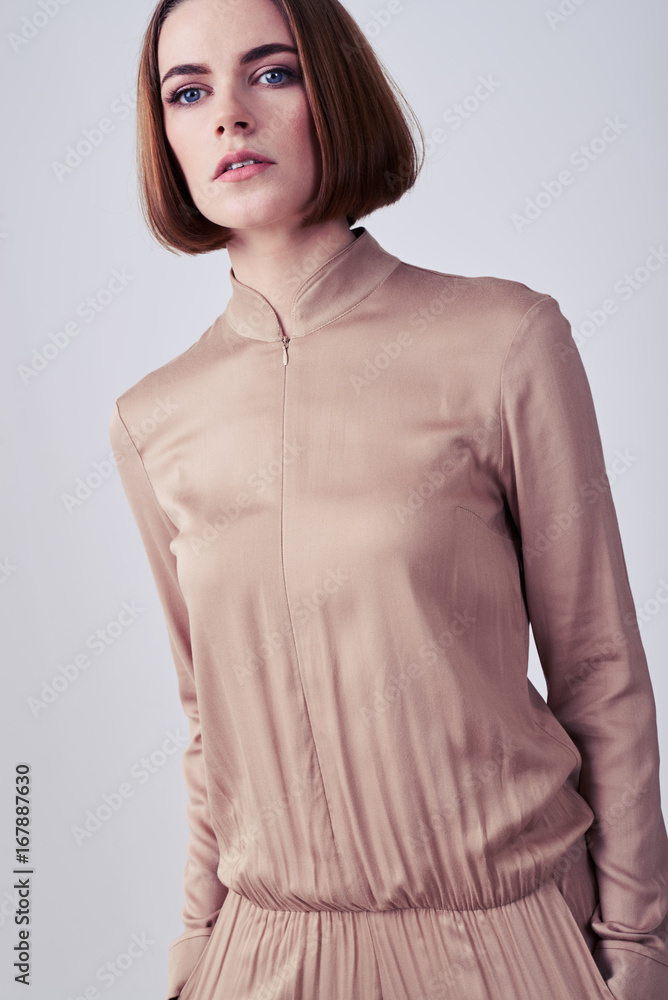 Nice model posing in beige overalls Nice model posing in beige overalls