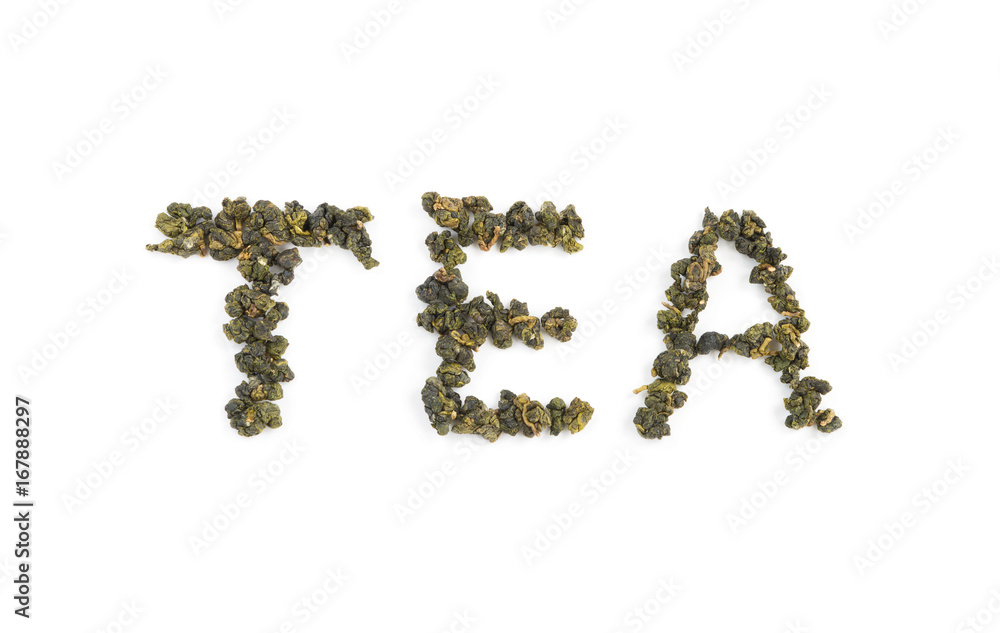 Fresh Tieguanyin Oolong tea leaves arranged in English letters as 