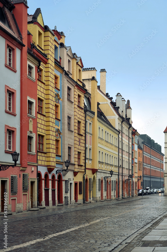 The central pedestrian street of Wroclaw with colorful old beautiful houses. Poland.