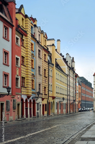 The central pedestrian street of Wroclaw with colorful old beautiful houses. Poland. © struvictory