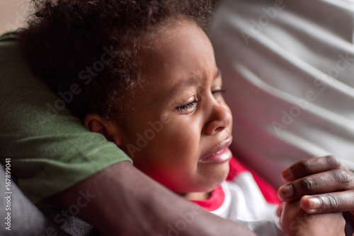 little african boy crying