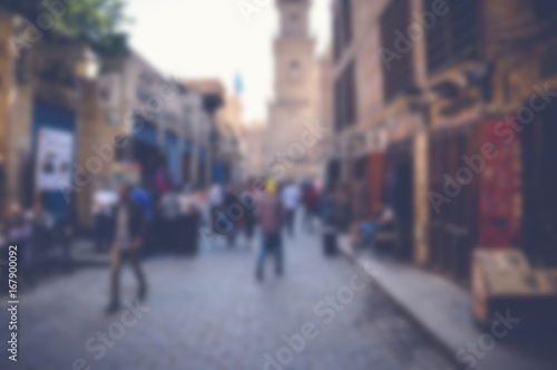 blurred background of people walking in the street