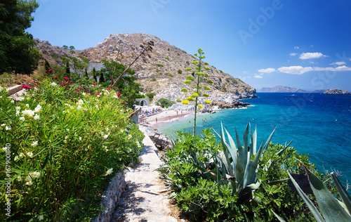 View from Hydra Island. Castello Hydra and Kamini beach. Blue sky