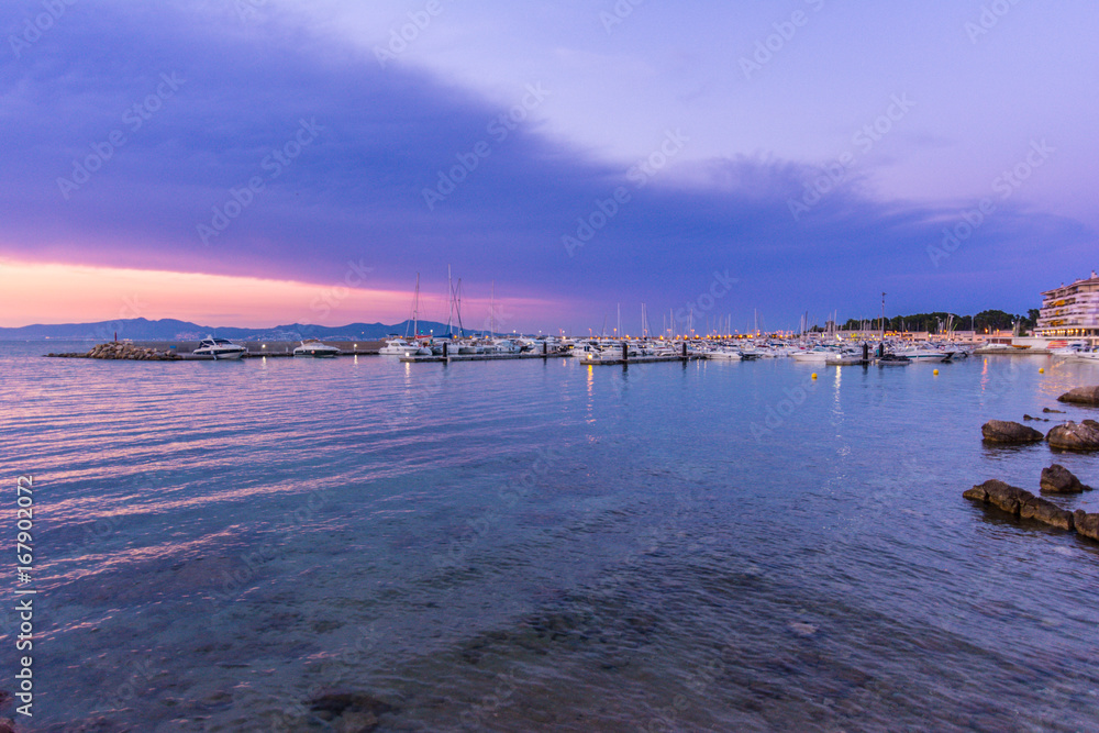 Obraz premium Sunset in quiet port of l'Escala, Costa Brava.