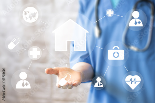 Doctor pushing button house home virtual healthcare network on virtual panel