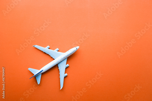 Model plane,airplane on pastel color backgrounds.Flat lay design.