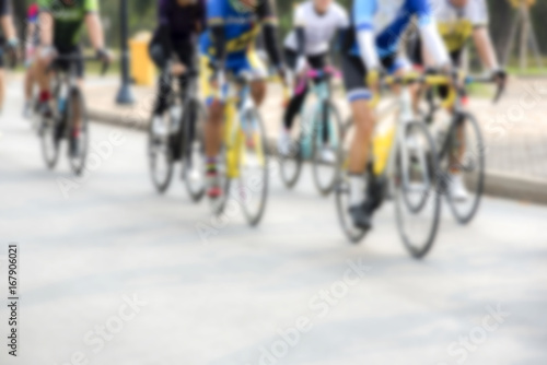 Cycling competition,cyclist athletes riding a race at high speed / blur © Boonchai