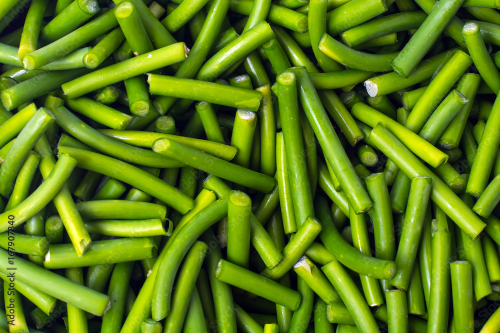Green chopped pods of beans on white background Green chopped pods of beans on white background