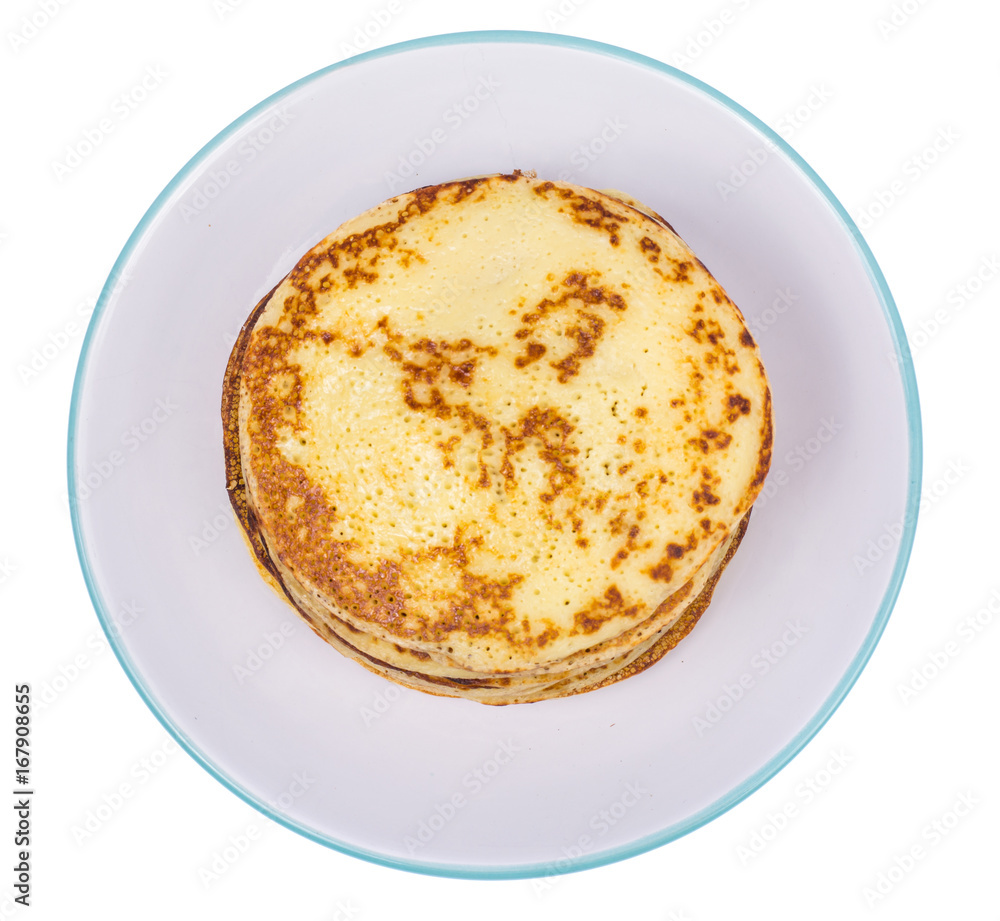Crispy thin pancakes on plate, light background Crispy thin pancakes on plate, light background