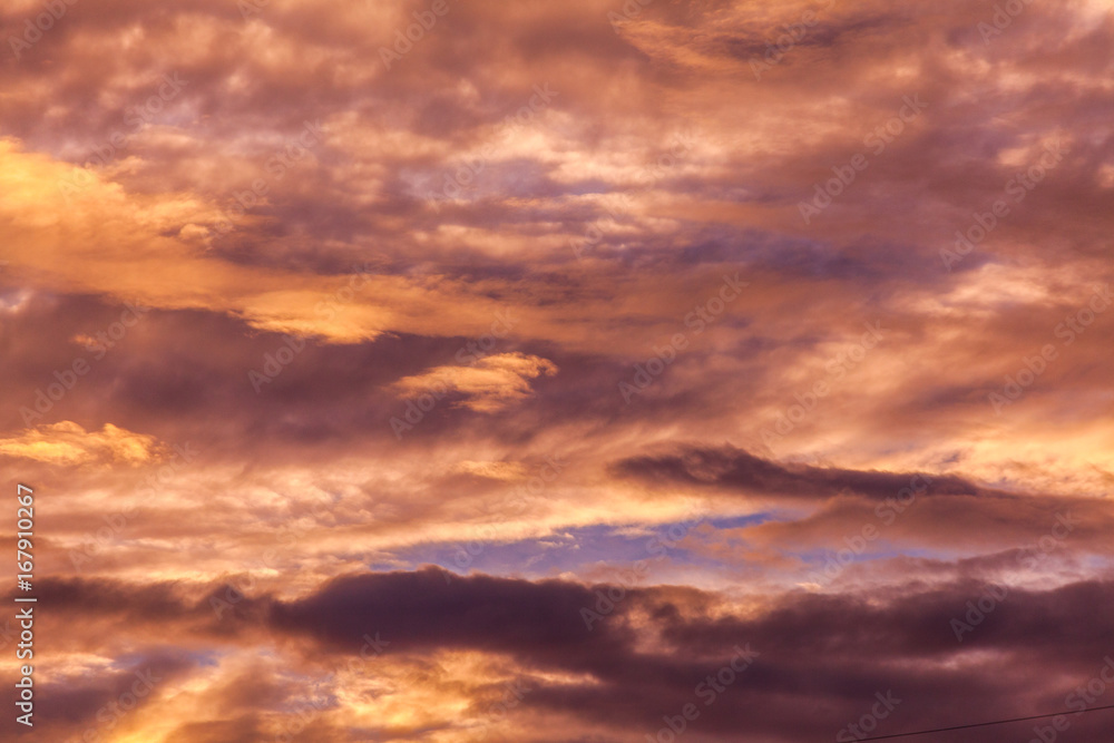 Red voluminous clouds at sunrise