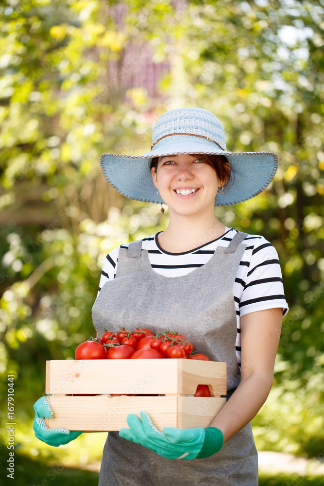Photo of woman with tomato