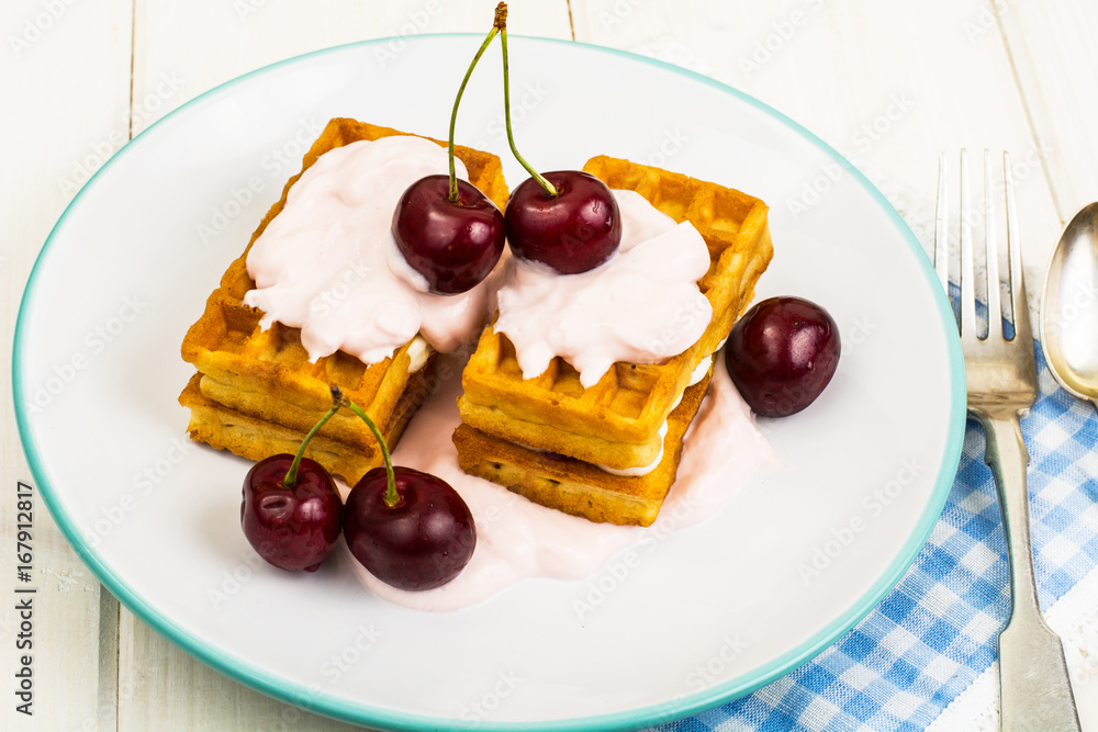 Sweet waffles with yoghurt and cherry Sweet waffles with yoghurt and cherry