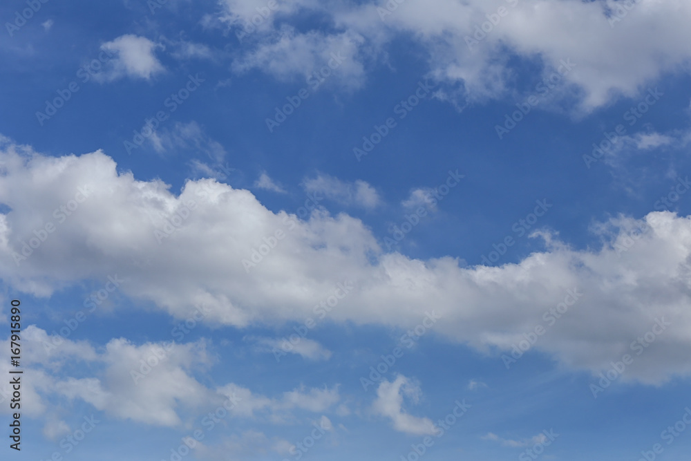 Blue sky with bright white clouds in daylight. Blue sky with bright white clouds in daylight.