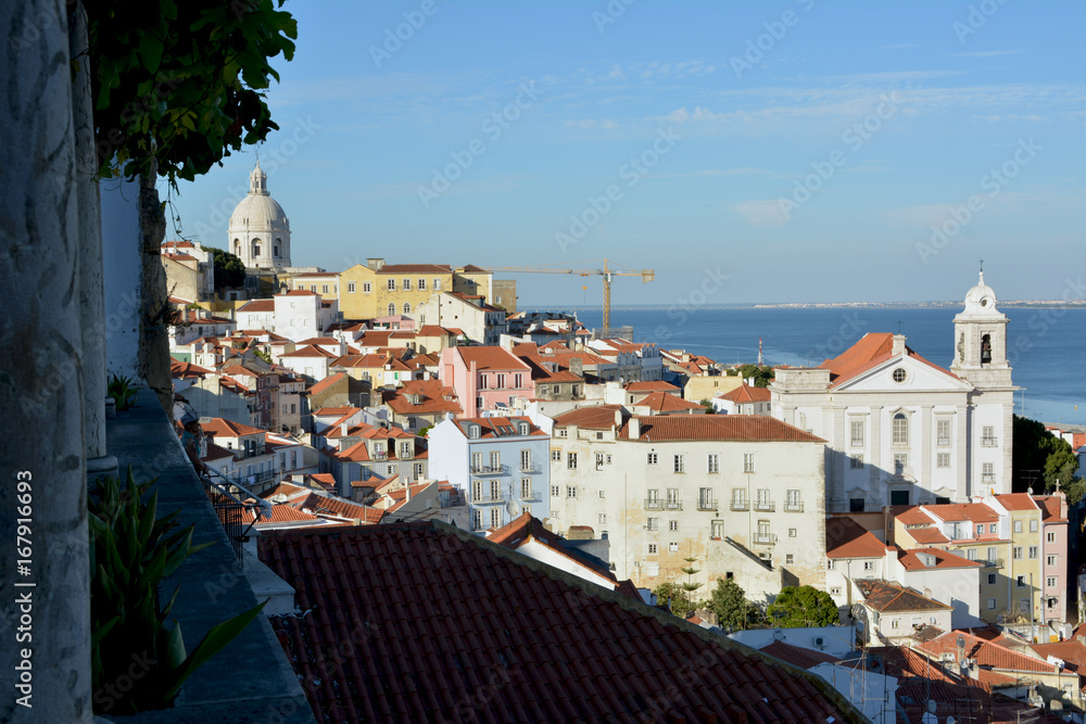 Perspective of Lisbon rooftops from an elevated portico with river and monuments  background 2