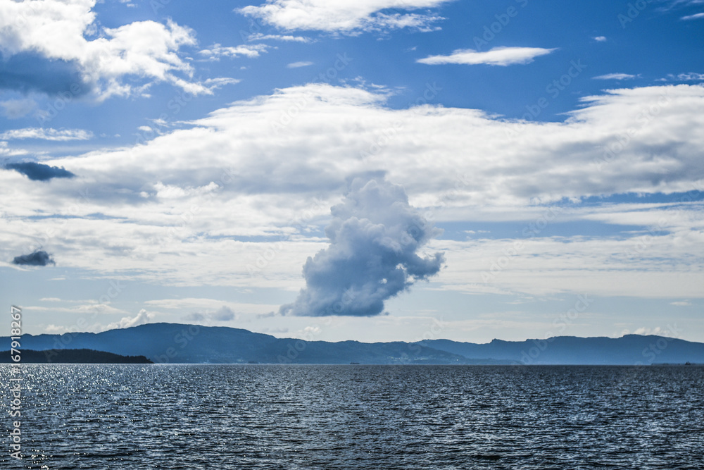 Beautiful landscape on the north sea in norway with clouds on a sunny day Beautiful landscape on the north sea in norway with clouds on a sunny day