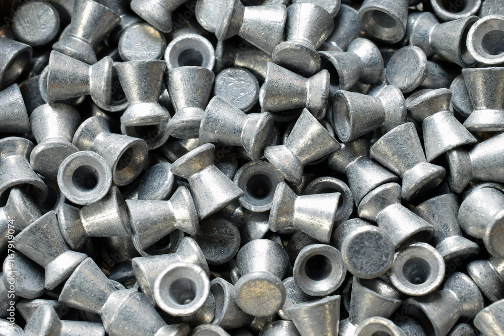 Air gun pellets background. Horizontal image. Air gun pellets background. Horizontal image.