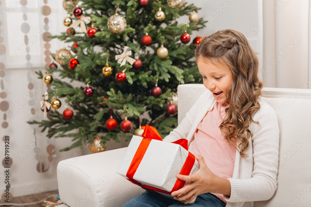 little girl with christmas gift little girl with christmas gift