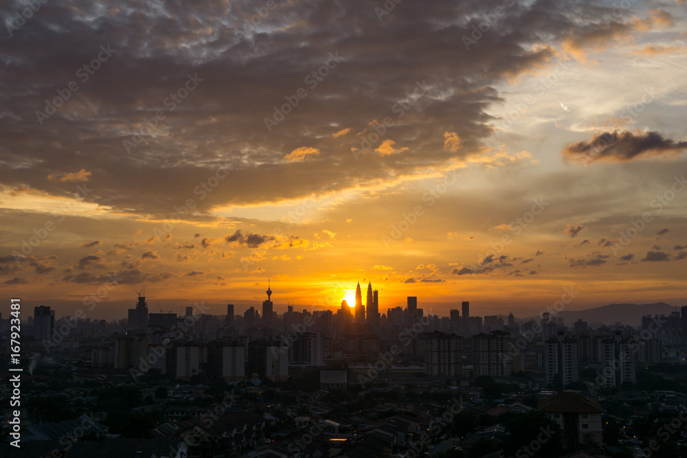 Majestic sunset in Kuala Lumpur, the capital of Malaysia. Its modern skyline is dominated by the 451m-tall KLCC, a pair of glass-and-steel-clad skyscrapers.