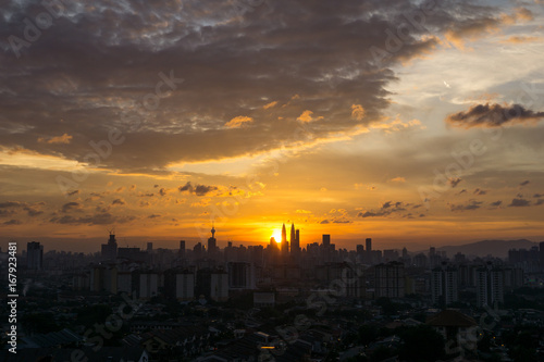 Majestic sunset in Kuala Lumpur, the capital of Malaysia. Its modern skyline is dominated by the 451m-tall KLCC, a pair of glass-and-steel-clad skyscrapers.
