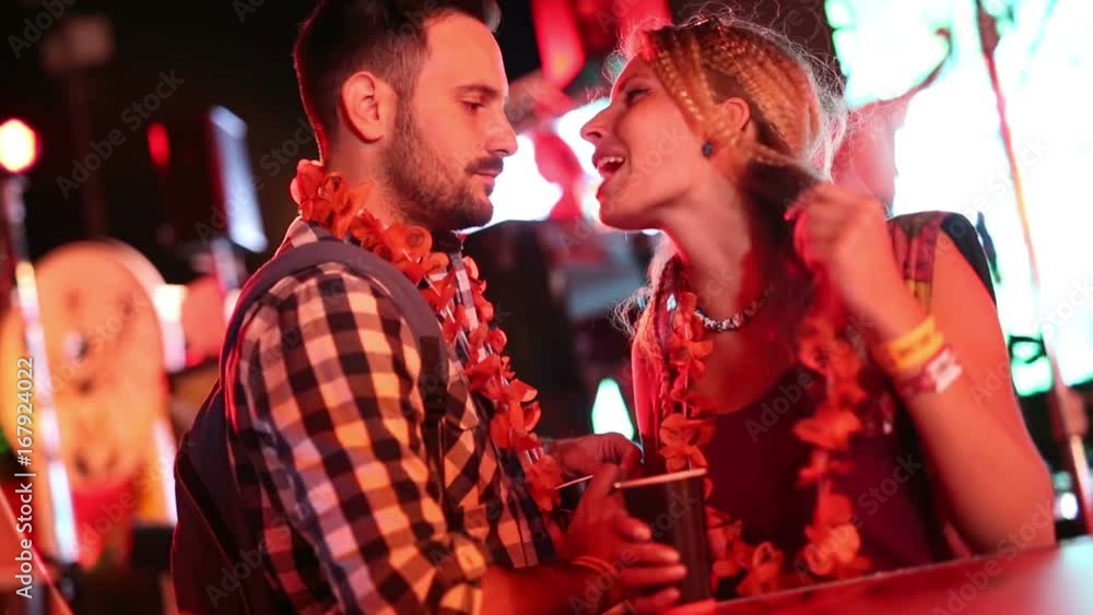 Festival party couple in summer having fun Festival party couple in summer having fun