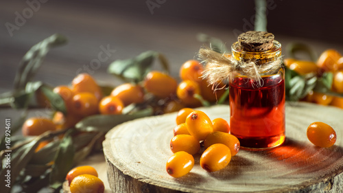 Cuadro en lienzo sea buckthorn oil in a small bottle
