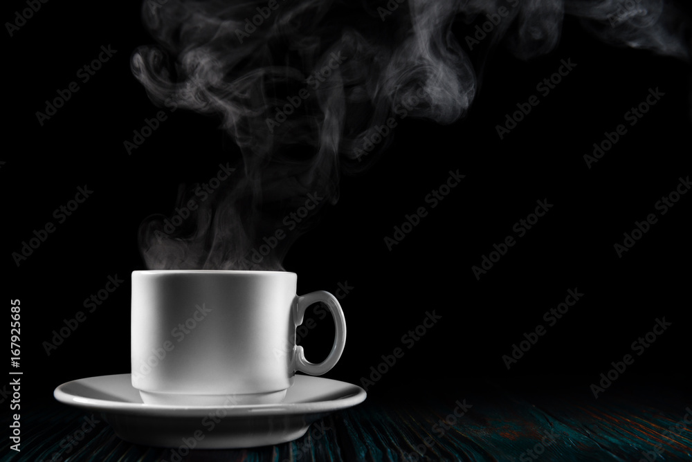 Freshly brewed coffee over black background Freshly brewed coffee over black background