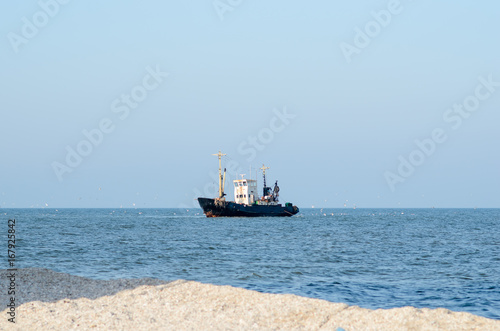Fototapeta Naklejka Na Ścianę i Meble -  Fishing boat in the sea.