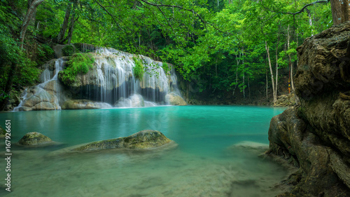 Fototapeta Naklejka Na Ścianę i Meble -  Wonderful green waterfall at deep forest, Erawan waterfall located Kanchanaburi Province, Thailand