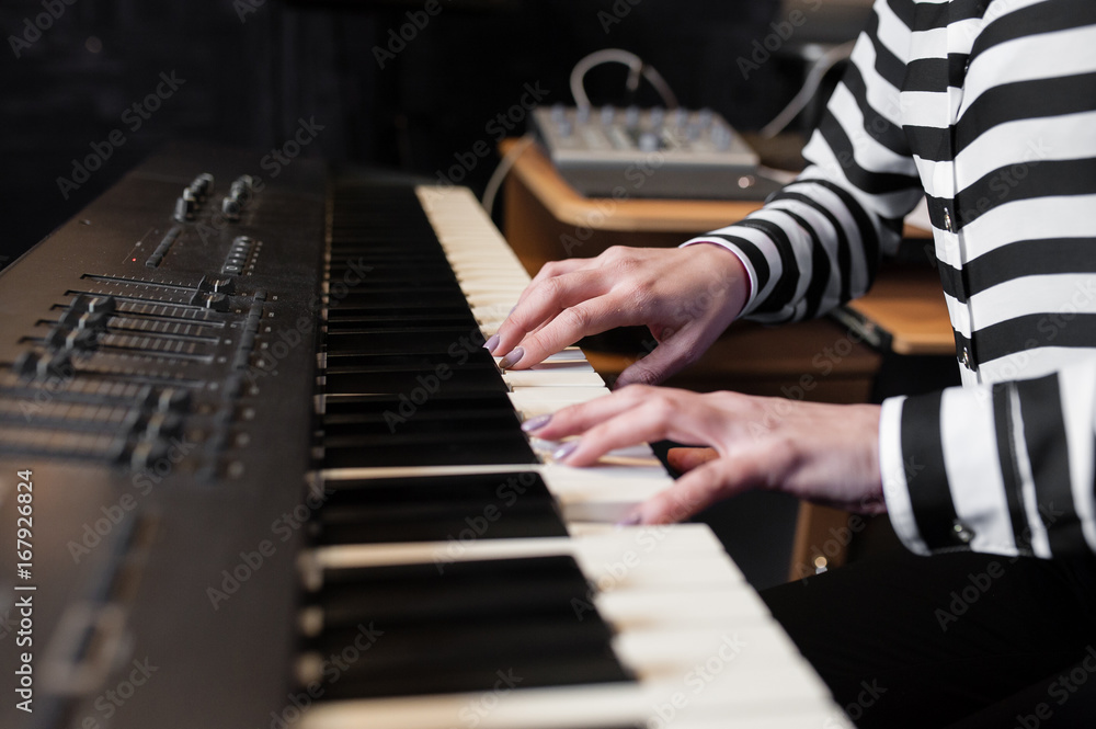 Fototapeta premium Hands music, synthesizer, piano