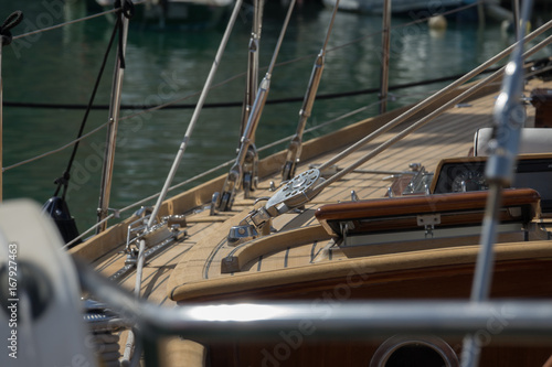 Rope pulley blocks marine vintage on an old Sailboat. Nautical detail on a dark background