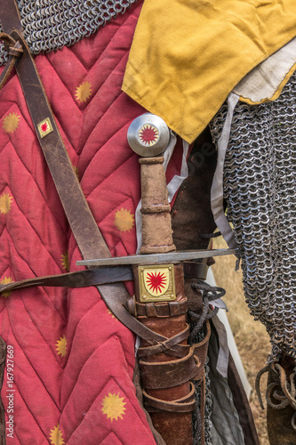 Medieval sword hilt detail, chainmail, sword and shields a medieval armor knight ready for battle detail