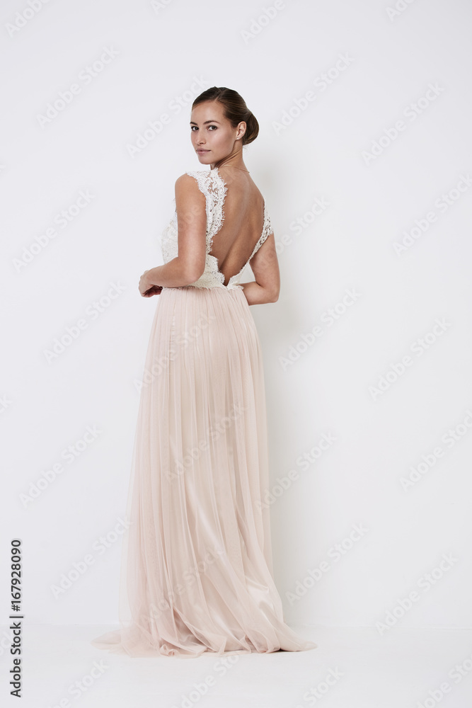 Glamorous beauty in ball gown in studio, portrait Glamorous beauty in ball gown in studio, portrait