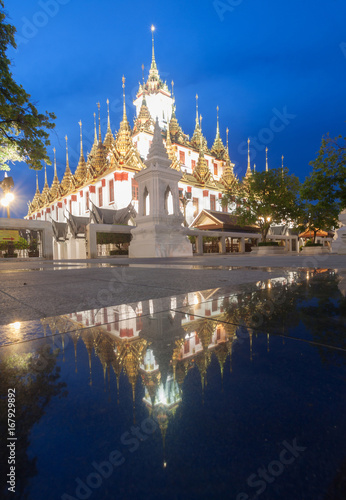 Famous temple at Night: Loha prasat (metallic castle) of Ratchanadda Temple in Bangkok, Thailand