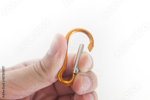 Yellow carabiner isolated photo