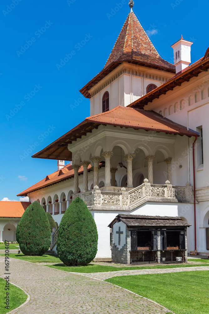 Exterior, facade of building Brancoveanu orthodox monastery with courtyard area in Sambata de Sus village, Romania