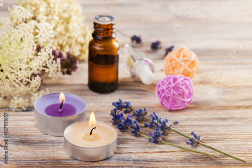 Spa composition with essential oil and candles