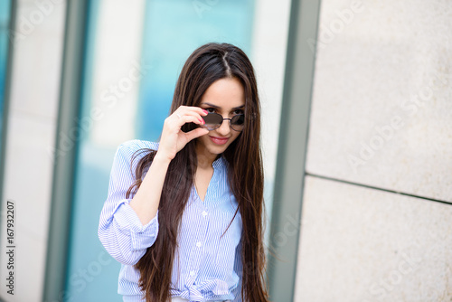 Beautiful girl in sunglasses.