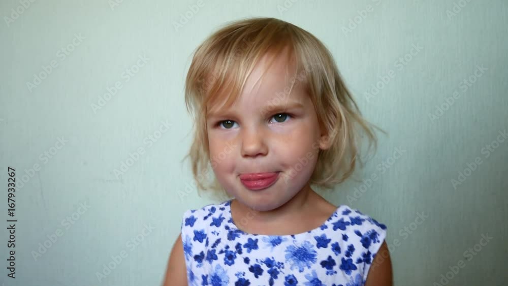 Portrait of a girl. The child makes different emotions. Portrait of a girl. The child makes different emotions.
