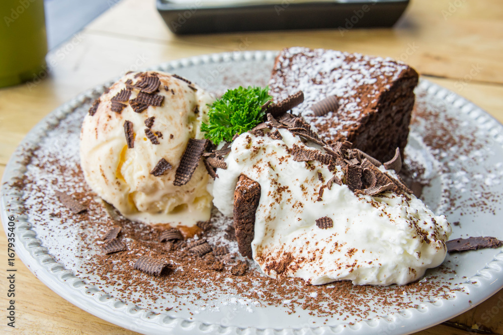 ice cream Vanilla chocolate pie whippin creamy tasty dessert on wood table in cafe ready to eat in restaurant. ice cream Vanilla chocolate pie whippin creamy tasty dessert on wood table in cafe ready to eat in restaurant.