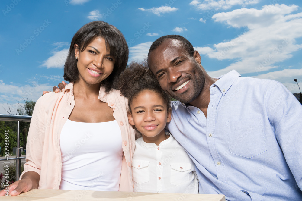 beautiful african-american family bonding outdoors beautiful african-american family bonding outdoors