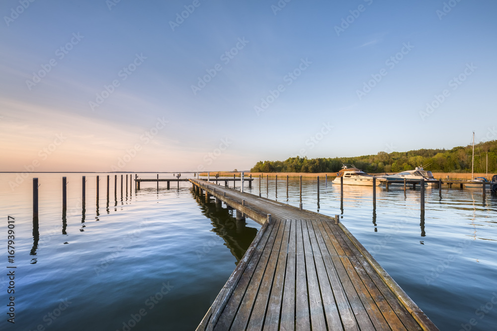 Sundown at marina, Jasmunder Bodden, Ralswiek, Rügen Island, Mecklenburg-Western Pomerania, Germany Sundown at marina, Jasmunder Bodden, Ralswiek, Rügen Island, Mecklenburg-Western Pomerania, Germany