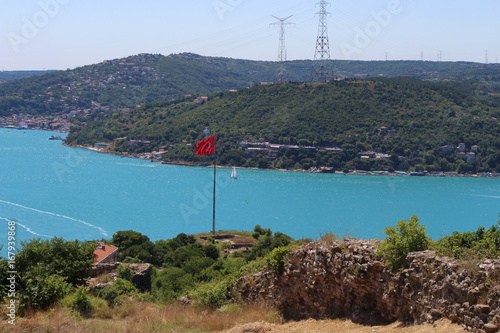 istanbul bosphorus and turkish flag
