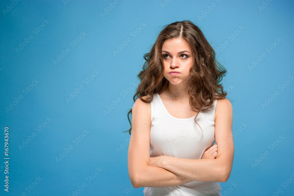 The young woman's portrait with sad emotions The young woman's portrait with sad emotions