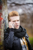 man talking on mobile phone outdoor