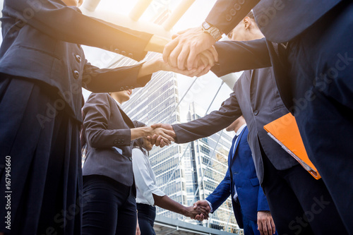 group of hand shake from business peoples after agreement