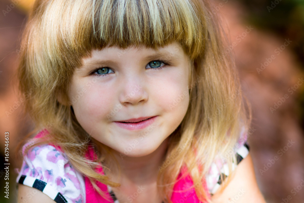 Beautiful portrait of a happy little girl smiling close-up Beautiful portrait of a happy little girl smiling close-up