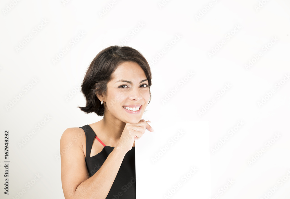 Beautiful young woman holding a blank sheet of paper Beautiful young woman holding a blank sheet of paper